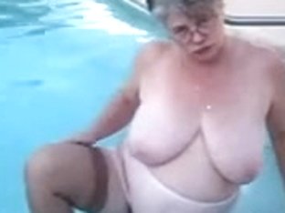 Corpulent Granny In Nylons Plays In The Pool