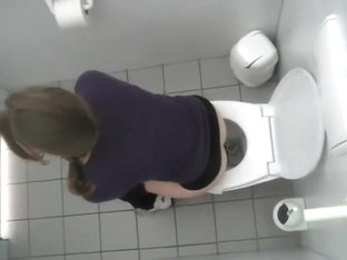 Voyeur Spies A College Girl In The Toilet