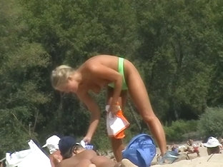 Teeny Blonde Model Topless On A Nude Beach Taking Her Pants Off