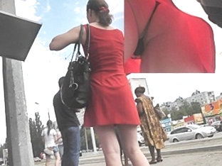 Alluring upskirt playgirl in a hawt red costume