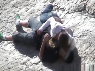 Girl Masturbates Her Guy In The Rocks