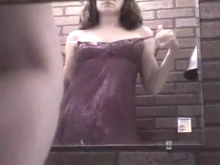 Brunette in Brick Dressing Room Voyeur Video