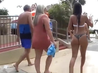 Two chicks with nice asses walking