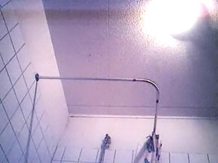 She washes her body and gets dressed on shower hidden cam