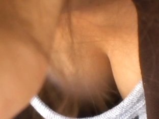 Downblouse hidden cam clip of a sexy Asian babe