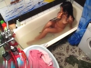 Tanned Solo Chick In The Bathtub