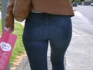 Candid ass in tight jeans tan leather jacket