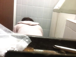 Female Bent Over The Bowl And Shot On The Toilet Cam