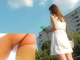 Skinny ass of young gal presented in oops upskirt act