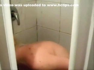 Belinda takes a shower