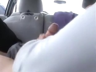 Dude Gets A Handjob From His GF In His Car On A Parking Lot