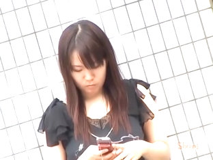 Tantalizing Oriental Chick Messing With Her Phone During Quick Sharking Scene