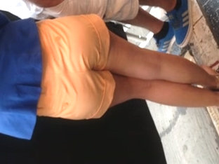 Very Nice Ass In Small Orange Shorts