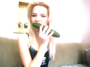 Teen Beauty Plays With A Cucumber
