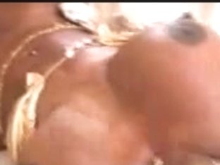 Black slut enjoys a white dick in her oiled up pussy