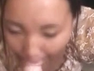 Cute Oriental girlfriend giving blow job