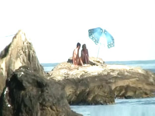 Couple caught fucking in the rocks