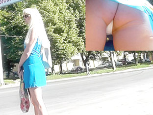 Public upskirt in the fresh air of the blonde female