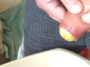 Foreskin bulge from large potato and pissing