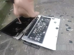 Laptop Crushed Stamped On And Destroyed In High Heels