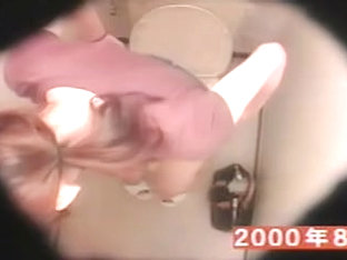 Pissing in the toilet amateur teen gets voyeured on the bowl