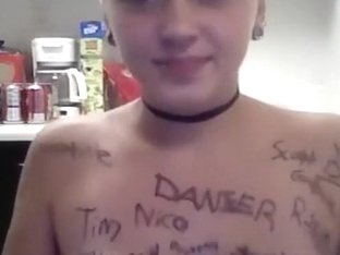 Ponytailed Blonde Girl Writes All Kinds Of Words On Her Naked Body In The Kitchen