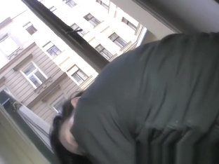 She is fucked from behind in a public stair well