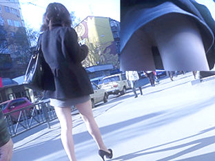 Hidden upskirt video presents sexy girl on high heels