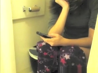 Girl pulls her pajama down to pee