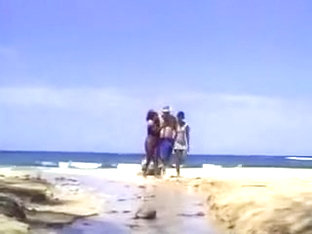 A Lucky Man On The Beach With Two Ebony Nymphs