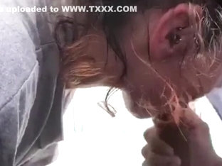 Little Redheaded Slut Makes Boyfriend Cum On Beach