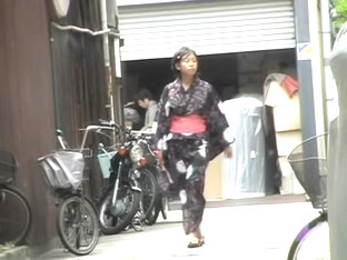Cute Asian In A Jukata Has Boob Sharking On The Street.