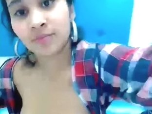A Hot Girl Showing Her Milk On Webcam.