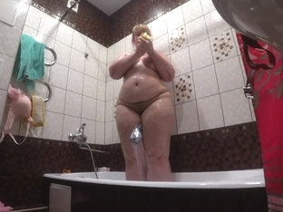 Lesbian Has Installed A Hidden Camera In The Bathroom At His Girlfriend. Peeping Behind A BBW With.