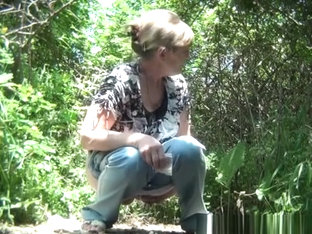 Mature Woman Caught In The Woods Pissing