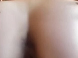 My wife riding and showing her darksome aperture