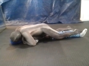 crocodile zentai struggles against masked dummy wrestler