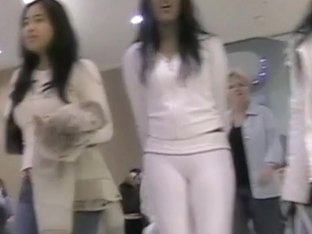 Asian chicks with perfect bodies walking at the mall