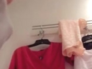 Nice babe tries out a new dress and gets recorded on camera