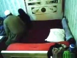 Voyeur Tapes An Arab Hijab Girl Having Missionary Sex With A Guy On The Bed