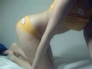 Pigtailed Teen Shows Her Posterior