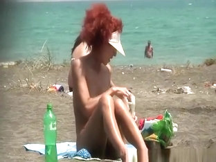 Redhead Woman Undresses Bikini At Beach