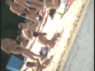 Nude beach voyeur film making extravaganza with hoes on the phone