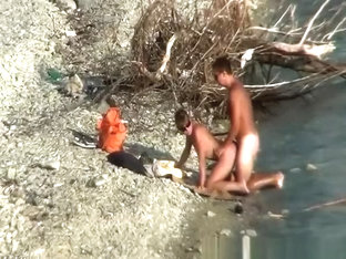 Nudist couple fucking by the water