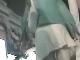Slutty Woman In A White Skirt Caught On A Hidden Cam
