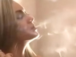 Sexy Teen Blonde Is Smoking A Cigarette