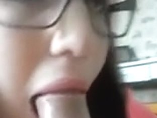 Cute Chick In Glasses Gives A Blowjob