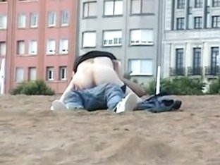 Couple Having Sex On The Beach