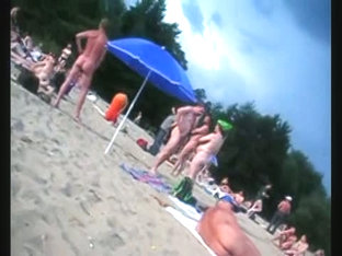 A Voracious Voyeur Loves Making Videos On The Nude Beach.