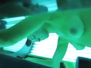 Woman spied in tanning bed